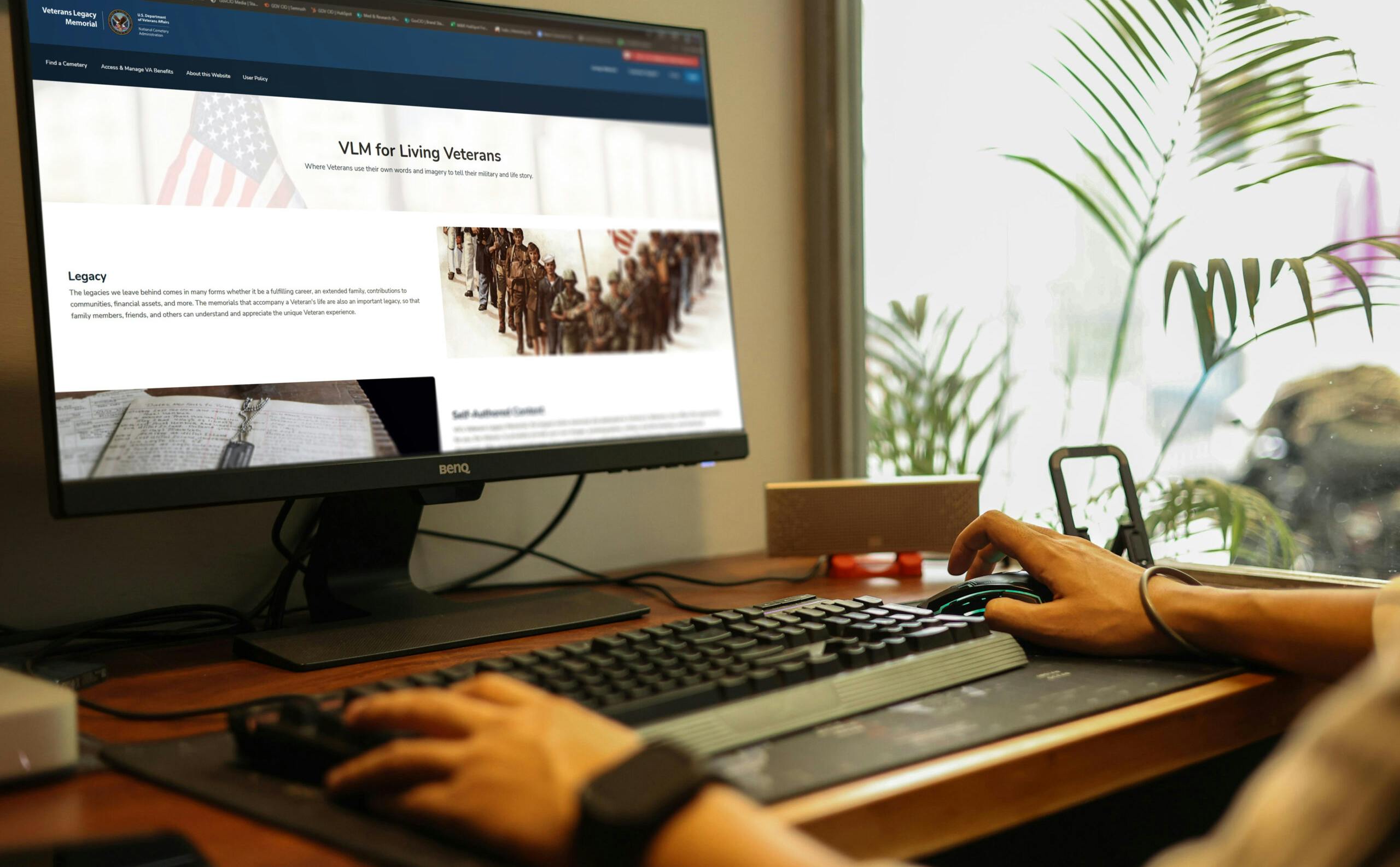 Person browsing the VLM website on their laptop