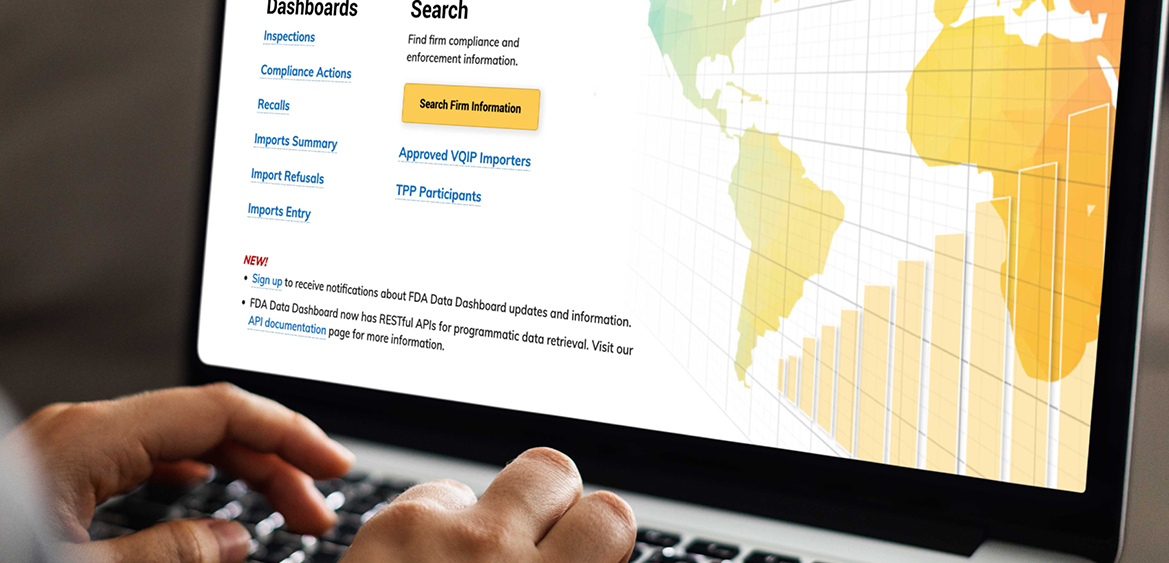 Image shows fingers at keyboard typing with lower half of screen showing world map. Case study FDA increasing accountability and transparency.
