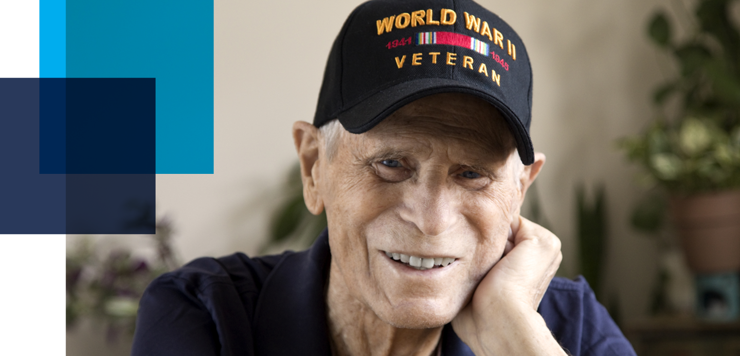 Image shows an older man wearing a World War II veteran hat. Case study image for Cyber VBA service related to: veteran benefit account, digitizing records, accelerating process through automation, veteran services, digital veteran records, digital veteran resources.