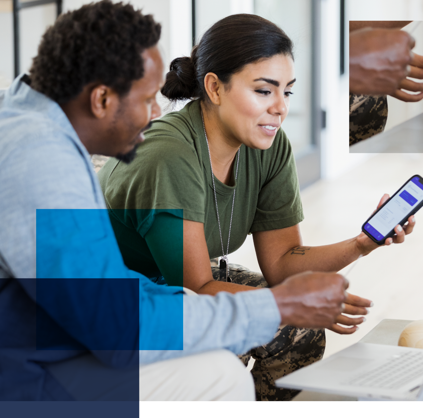 Woman and Man look at phone screen. Related to: case study VA IT modernization, veterans affairs modernization, NA IT software architecture