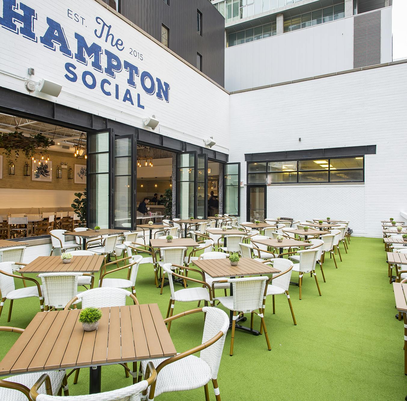 Image of the outside terrace of the Hampton Social club. Related to: HIMSS happy hour, hiring event, hiring event Chicago, health it, health it jobs
