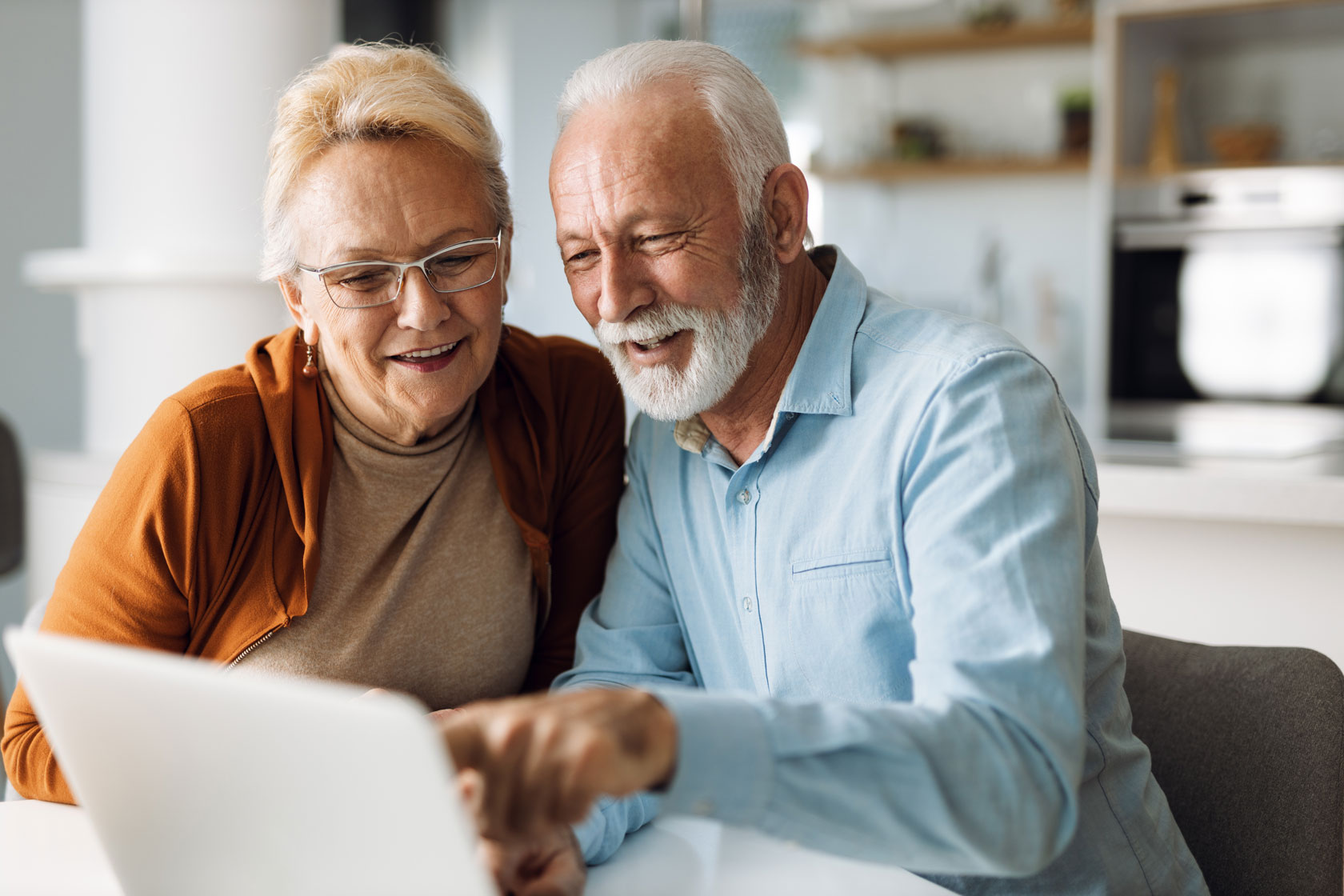 Retired couple at computer