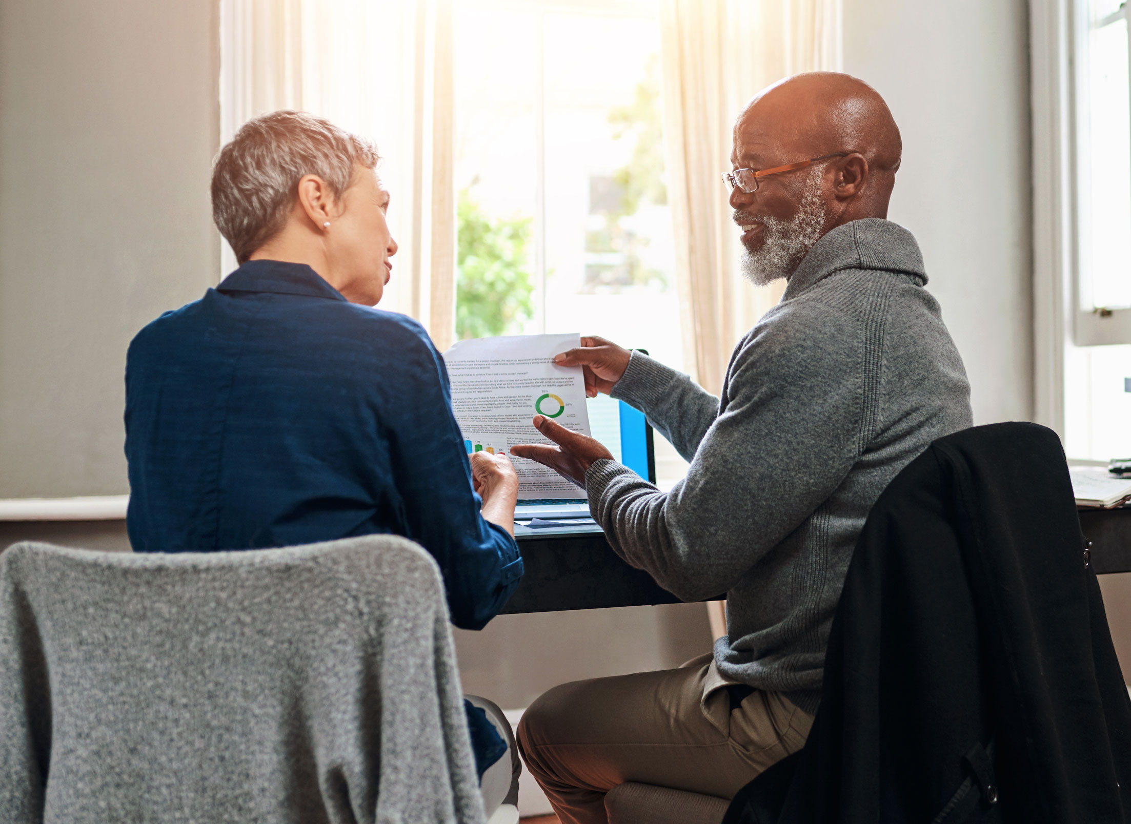 Older couple discussing finances