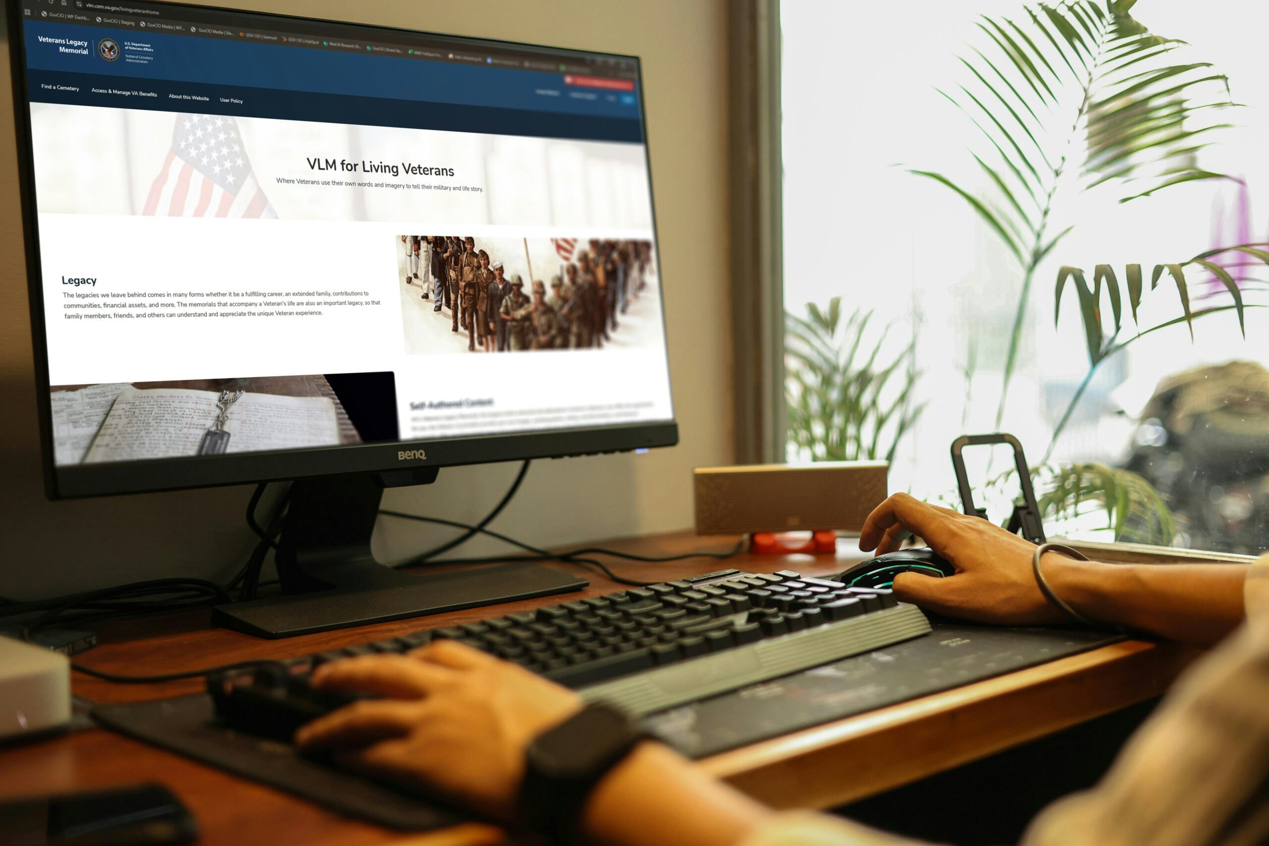Person browsing the VLM website on their laptop